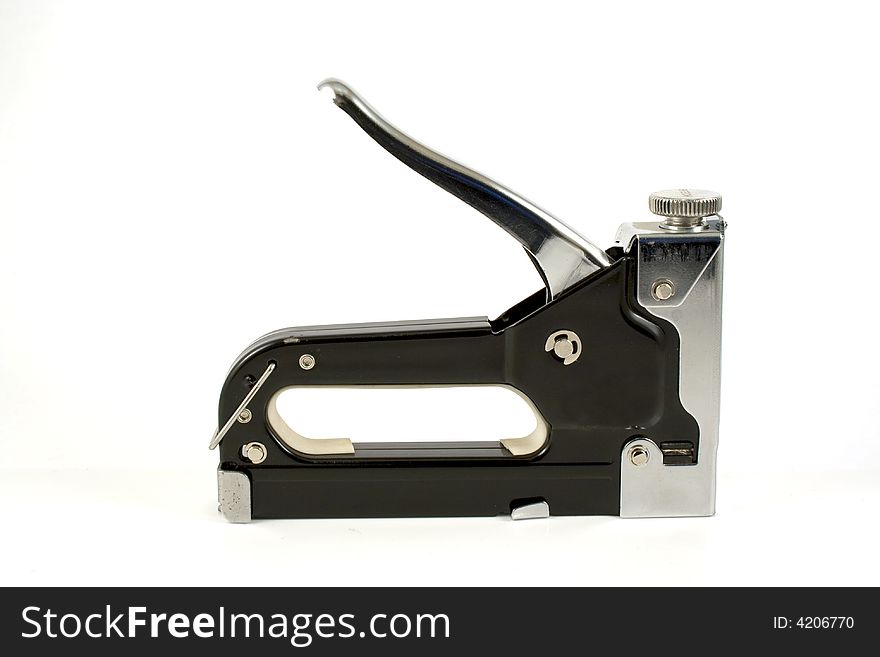 A furniturte stapler isolated on the white background. A furniturte stapler isolated on the white background