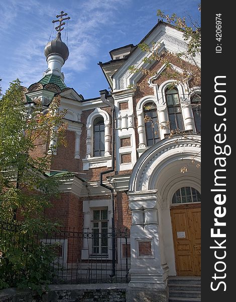 On a background of the light-blue sky church with domes. On a background of the light-blue sky church with domes.