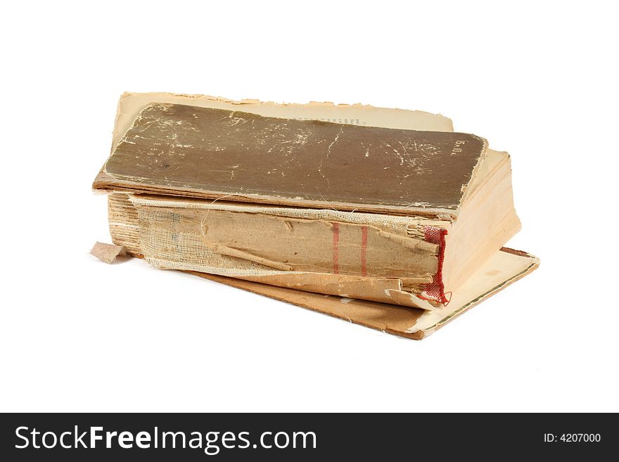 The old, fragmentary book isolated on a white background. The old, fragmentary book isolated on a white background