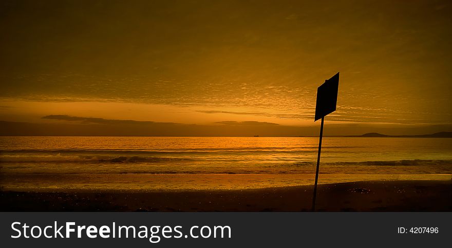 Black sea-Bulgaria-2008 It starts the new day. The sun punctures a road for itself in its oort clouds.Sunrise above the sea. Black sea-Bulgaria-2008 It starts the new day. The sun punctures a road for itself in its oort clouds.Sunrise above the sea