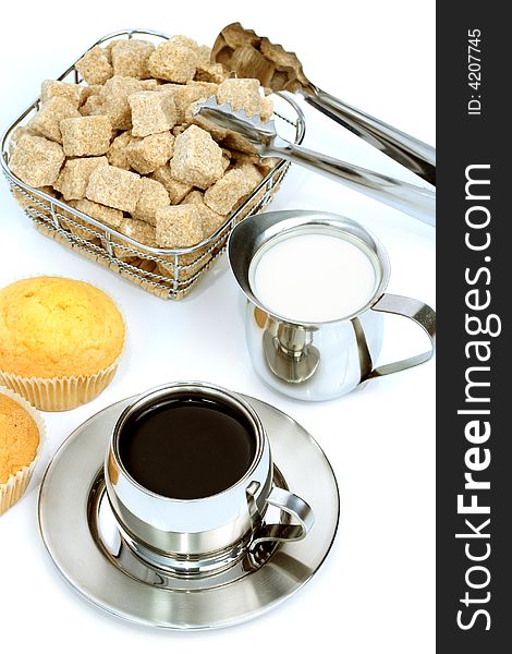 Cup of black coffee with brown sugar, muffin and milk 1. Cup of black coffee with brown sugar, muffin and milk 1