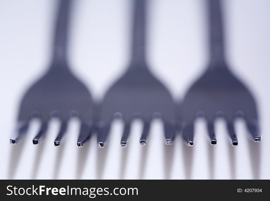 Macro photo of three forks