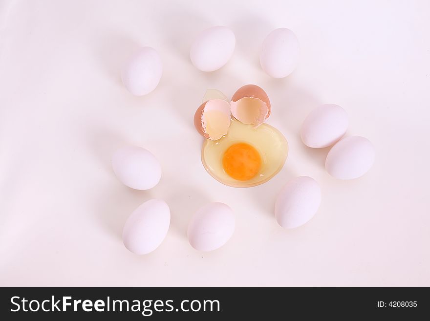 White and brown eggs on the table