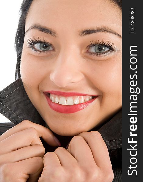 Portrait of the brunette with blue eye on white background