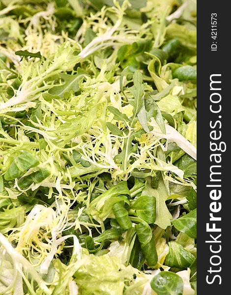 Lettuce leaves - vegetarian background - healthy and light food