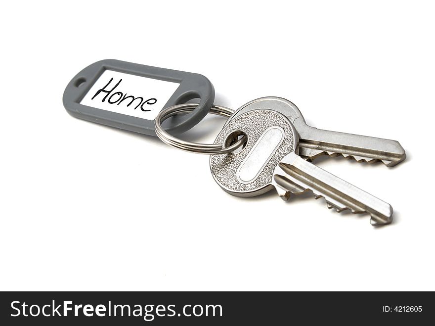 Key with home tag. Isolated on white background. Key with home tag. Isolated on white background.