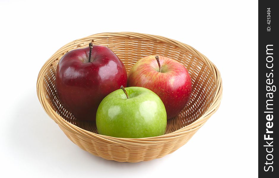 Red and Green Apples in Basket Isolated on White Background. Red and Green Apples in Basket Isolated on White Background