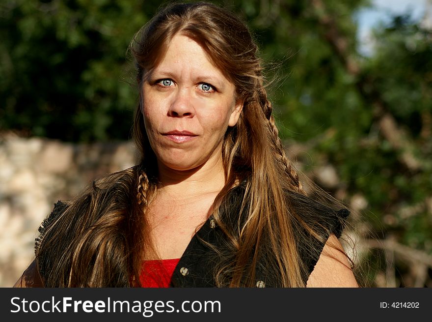 Pretty lady with long blonde hair, braids, and blue eyes. Pretty lady with long blonde hair, braids, and blue eyes.