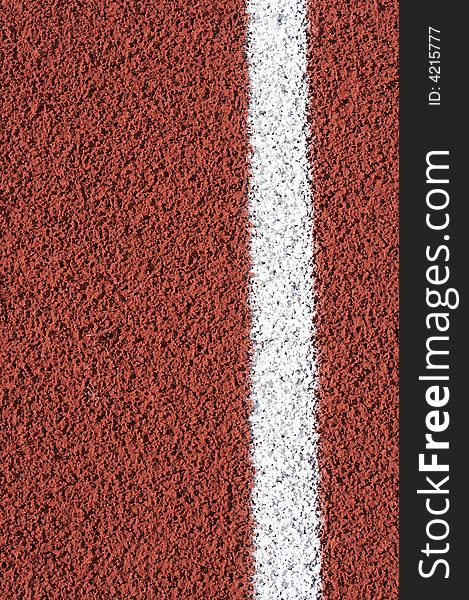 A macro picture of a track and field venue. A macro picture of a track and field venue