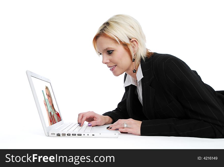 Businesswoman with laptop on white