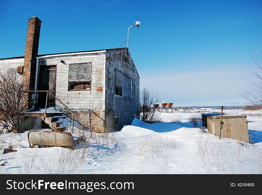 A utility building on a pier near retired coal docks. A utility building on a pier near retired coal docks.