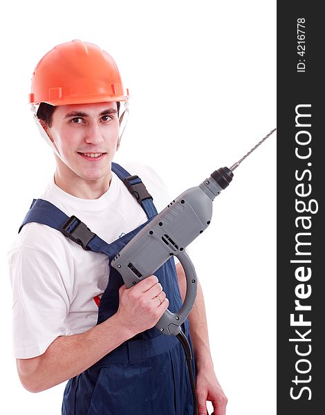 Muscular young man in a builder uniform with tools. Muscular young man in a builder uniform with tools.