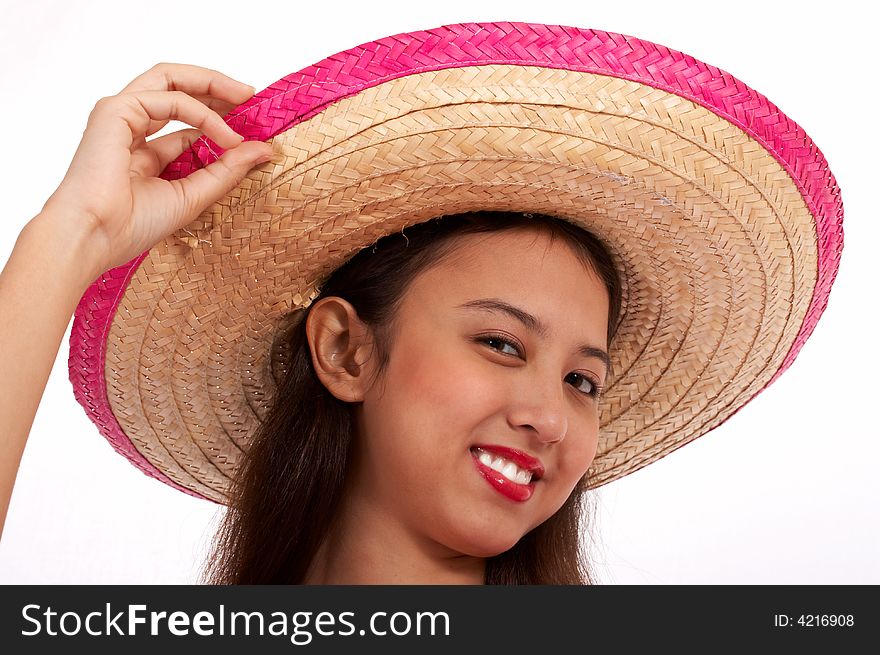 Happy young girl wearing a coconut hat