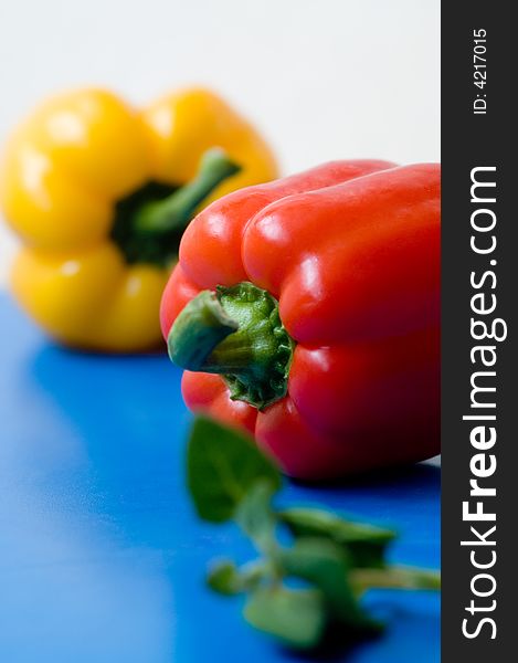 Capsicums on the blue background. Capsicums on the blue background