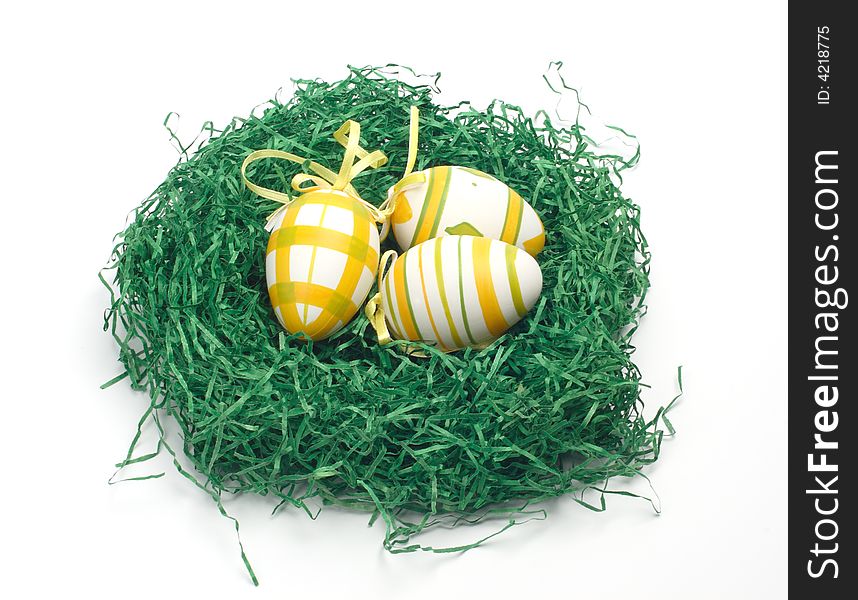 Easter eggs in green nest. Easter eggs in green nest