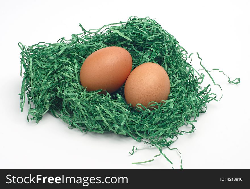 Easter eggs in green nest. Easter eggs in green nest