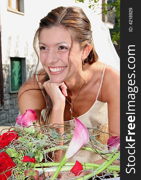 Young bride posing in the wedding day. Young bride posing in the wedding day