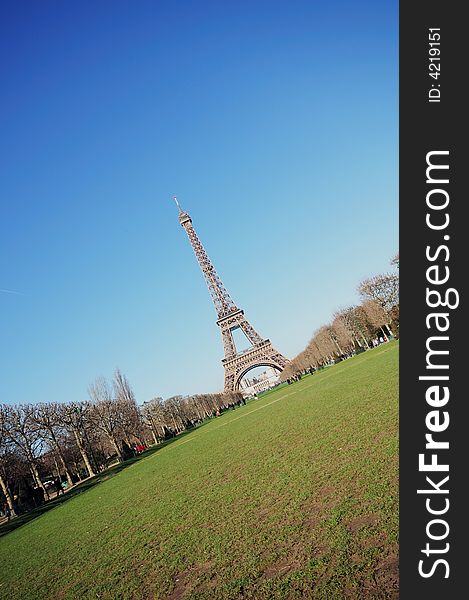 Eiffel Tower in Paris on a clear winter day in February with a deep blue sky. Eiffel Tower in Paris on a clear winter day in February with a deep blue sky.