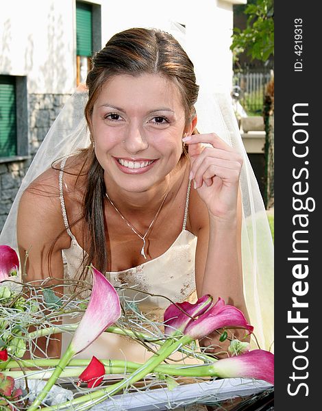 Young bride posing in the wedding day. Young bride posing in the wedding day