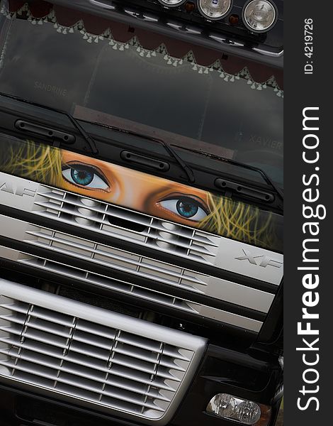 Eyes painted in front of a truck. Eyes painted in front of a truck