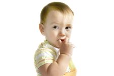 Baby Boy With Finger In His Mouth Stock Images