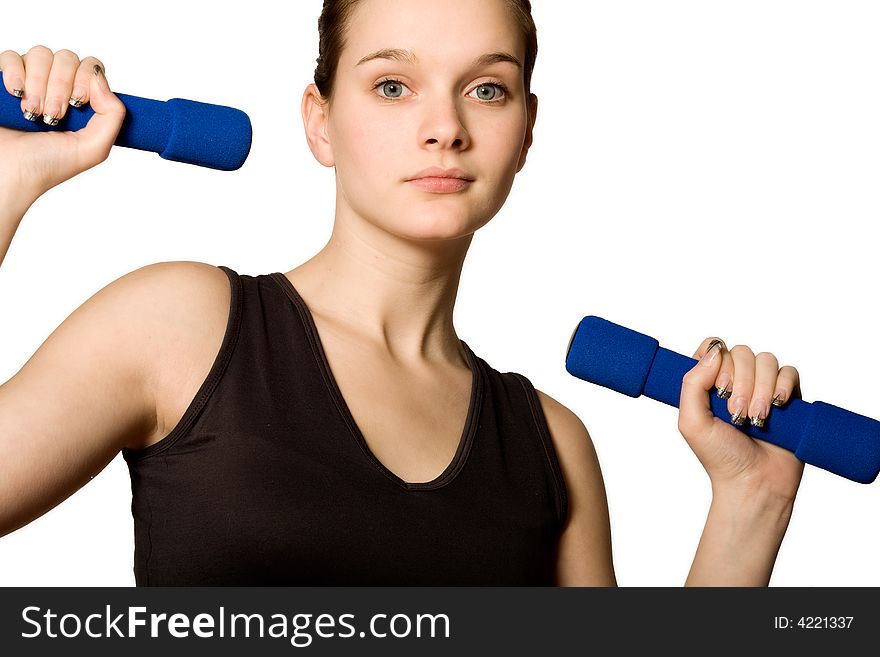 Young girl is sporting in the studio on a white background. Young girl is sporting in the studio on a white background