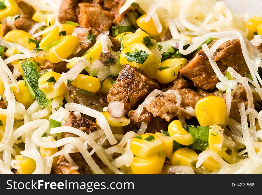 Macro shot of a burrito nice detail corn cheese meat. Macro shot of a burrito nice detail corn cheese meat