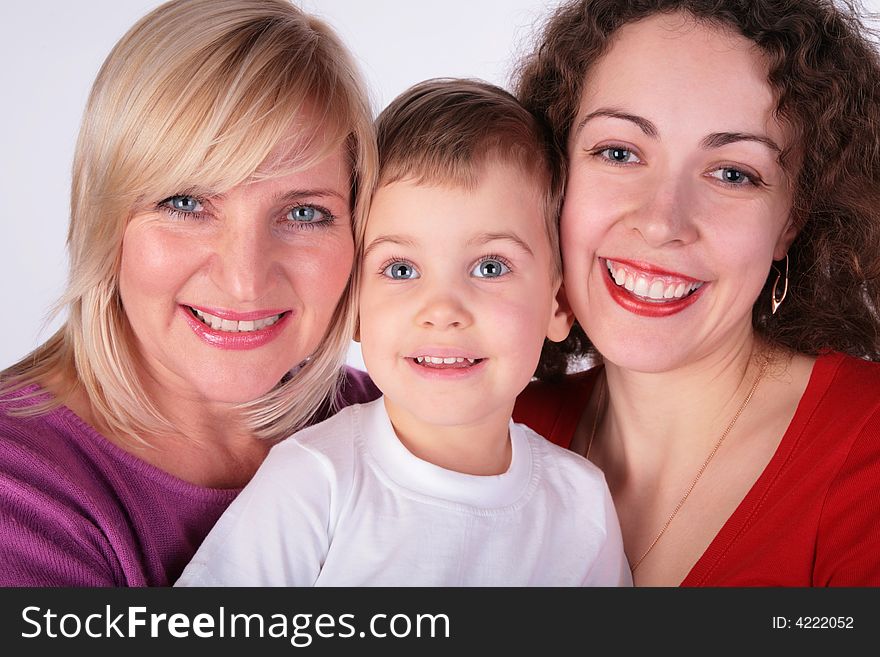 Grandmother, mother, baby on light background