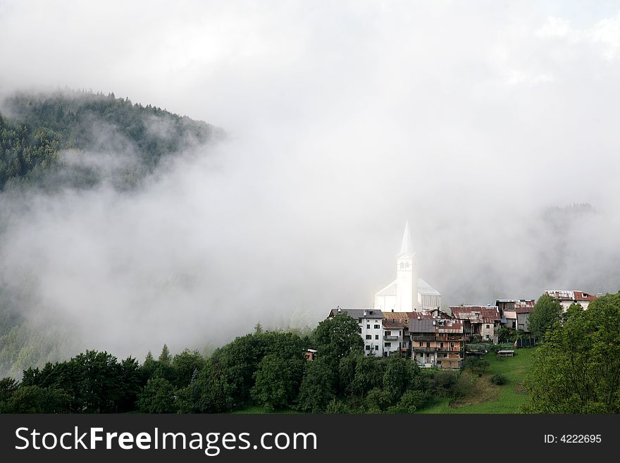 White church in Italy mountains