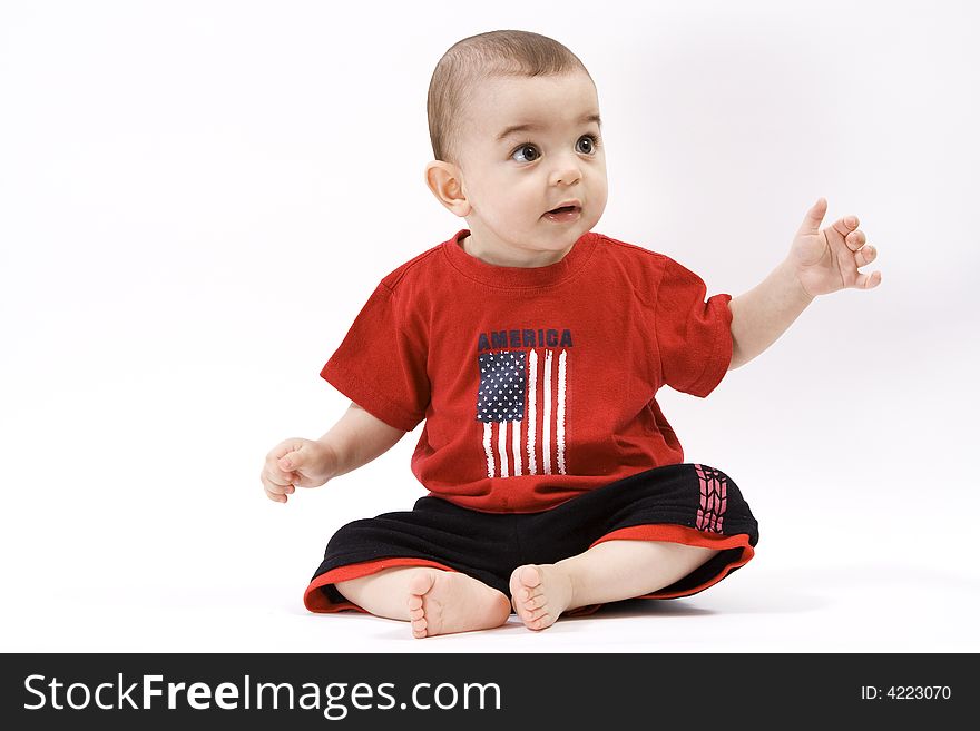 Curious baby in red t shirt