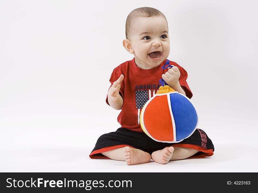 Curious baby in red t shirt