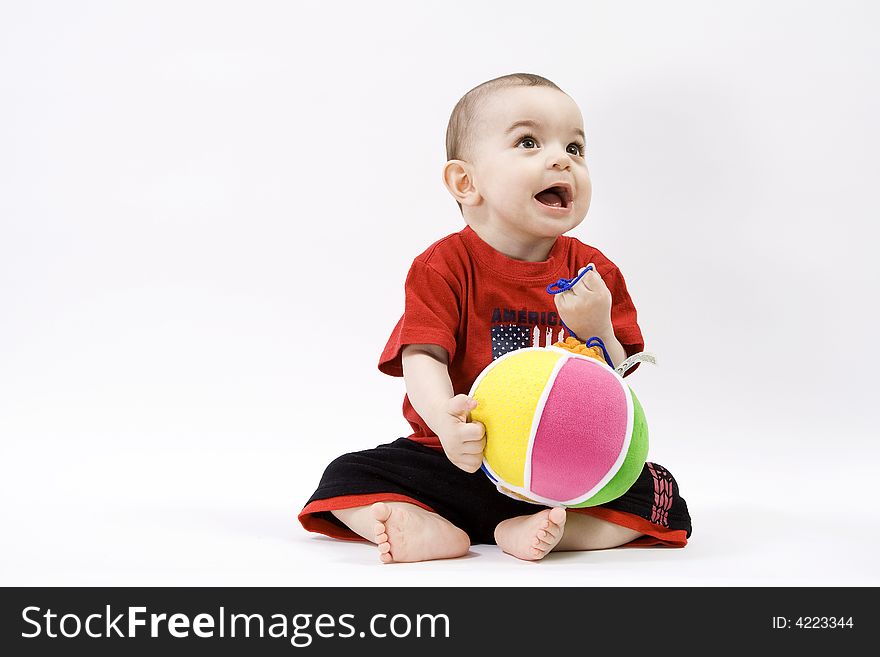 Curious baby in red t shirt. Curious baby in red t shirt