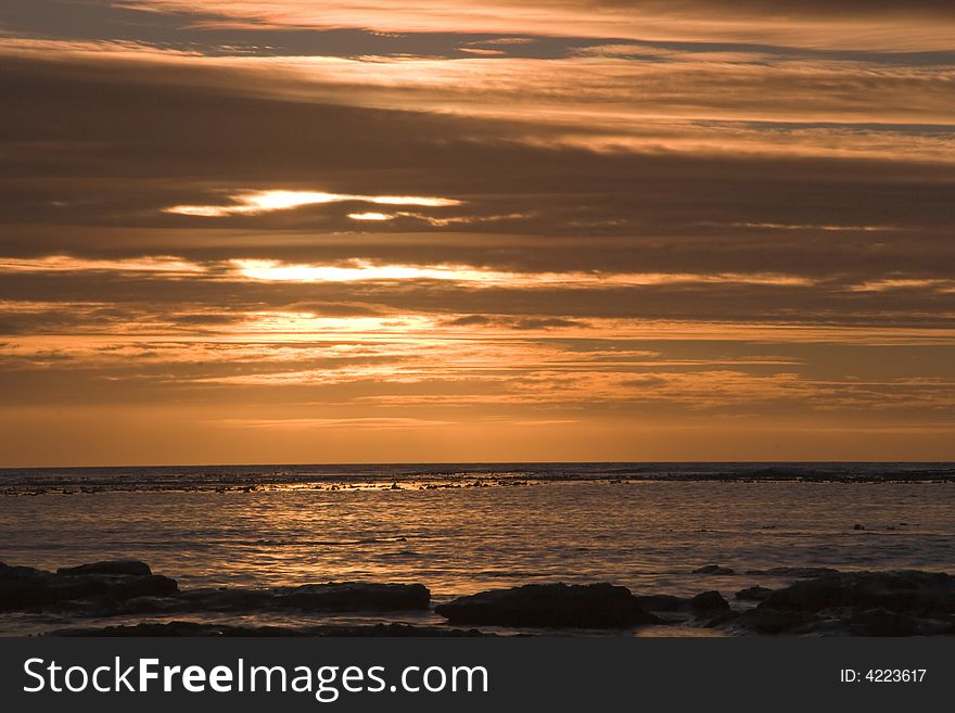 A sunset over the sea,Kommetjie,South Africa. A sunset over the sea,Kommetjie,South Africa