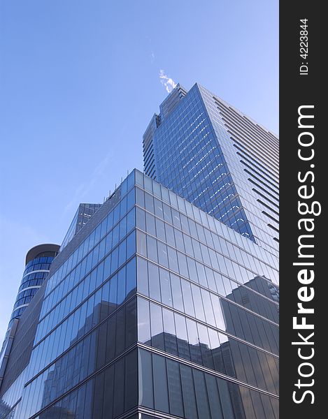 Modern skyscraper on sky background