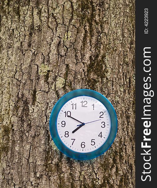 Abstract picture of a clock on a tree. Abstract picture of a clock on a tree