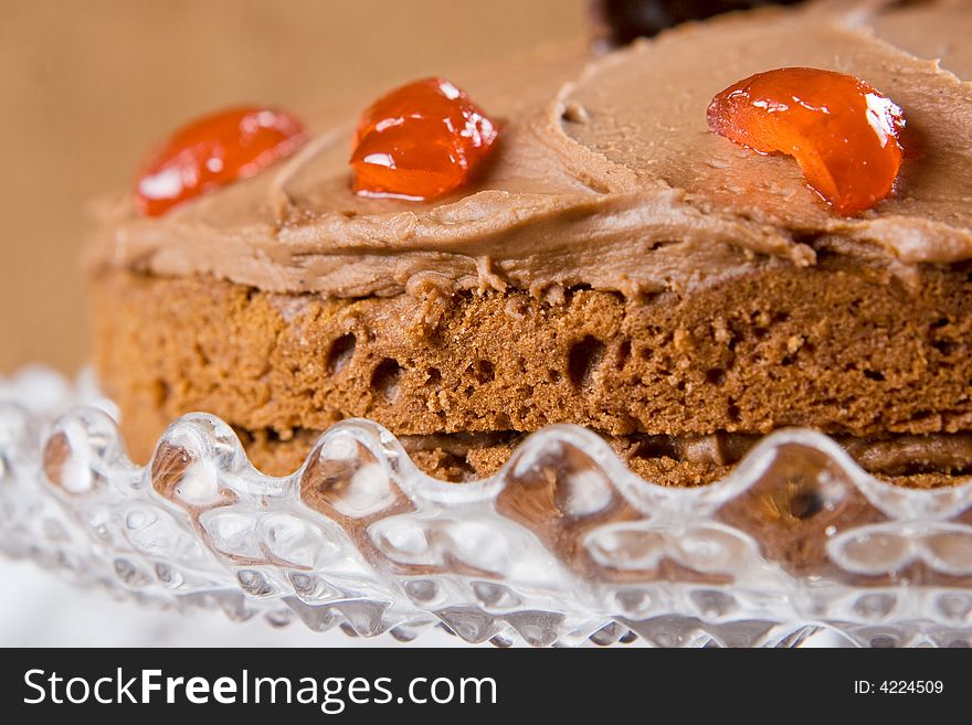 Freshly baked chocolate cake with red cherries. Freshly baked chocolate cake with red cherries