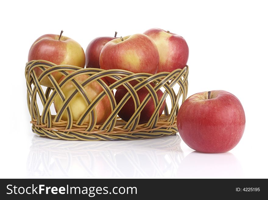 Apples in a basket isolated