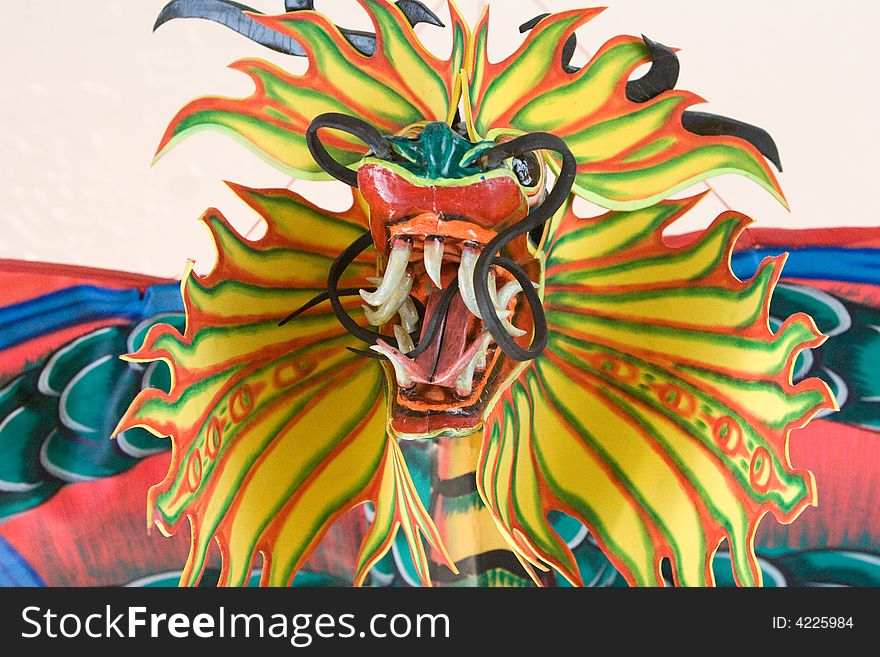 Ornamental dragon kite looms overhead
