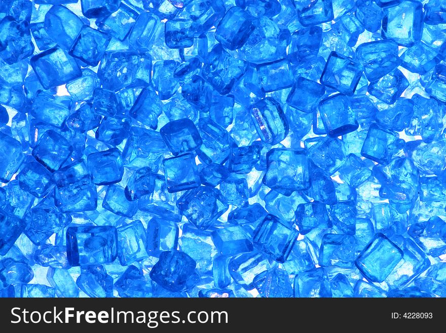 - macro of tiny blue twinkles/crystals (cake decor)
- backlight. - macro of tiny blue twinkles/crystals (cake decor)
- backlight