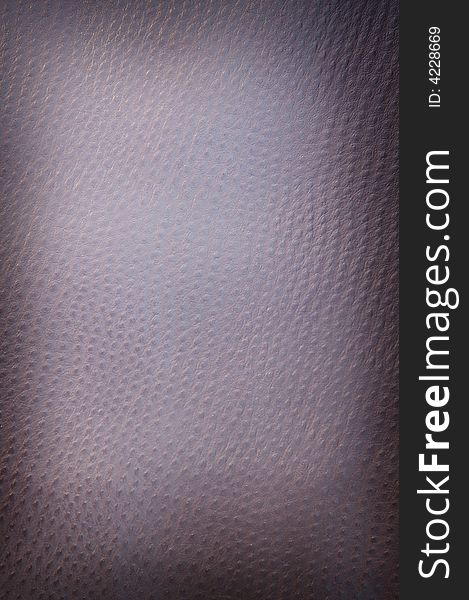 Dark spotted leather background shot square on