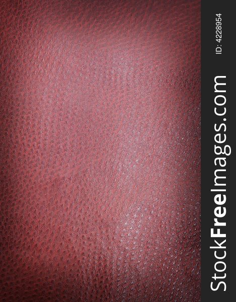 Burgundy spotted leather background shot square on