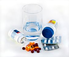 Pills And Glass Of Water Royalty Free Stock Image Pills And Glass Of Water Royalty Free Stock Image