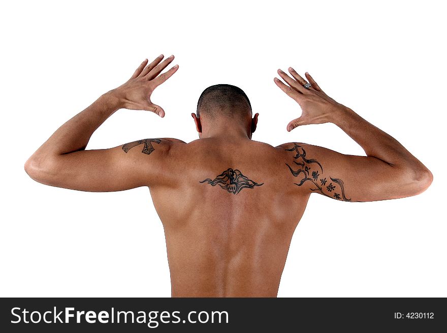 Young man showing his muscles and his tattooed back - isolated over white!. Young man showing his muscles and his tattooed back - isolated over white!