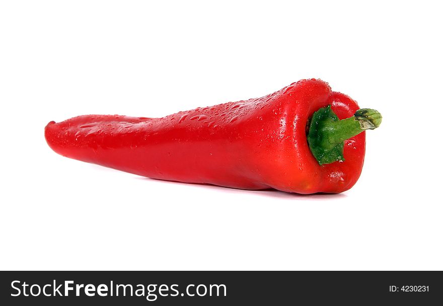 Shot of red pepper with waterdrops on it - over white background. Shot of red pepper with waterdrops on it - over white background.