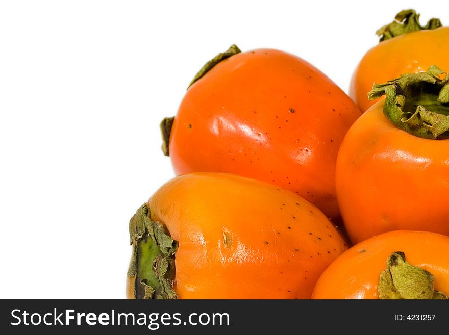 Fresh persimmon on white isolated background