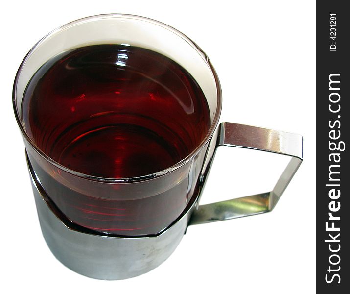 Black tea in glass on white background