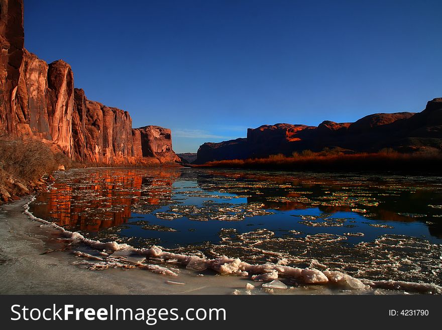 Red rock reflections on the Colorado River with Blue sky�s. Red rock reflections on the Colorado River with Blue sky�s