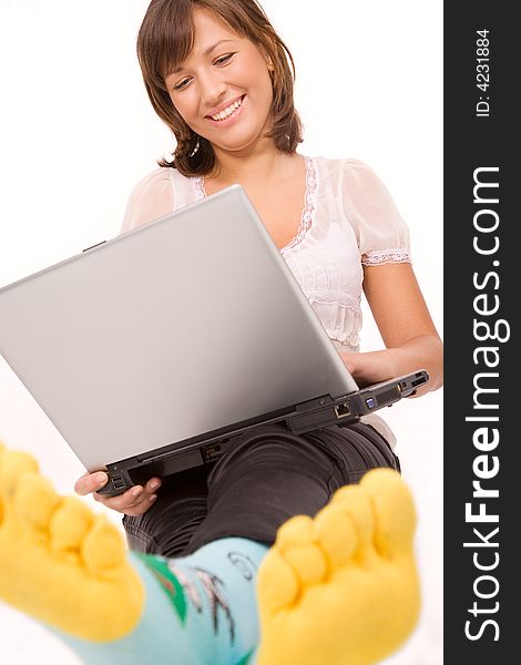 Confident smiling girl with laptop close-up