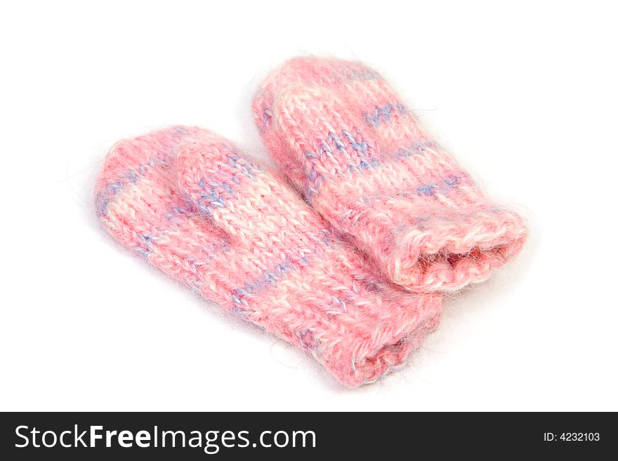 Child knitted mittens isolated on white