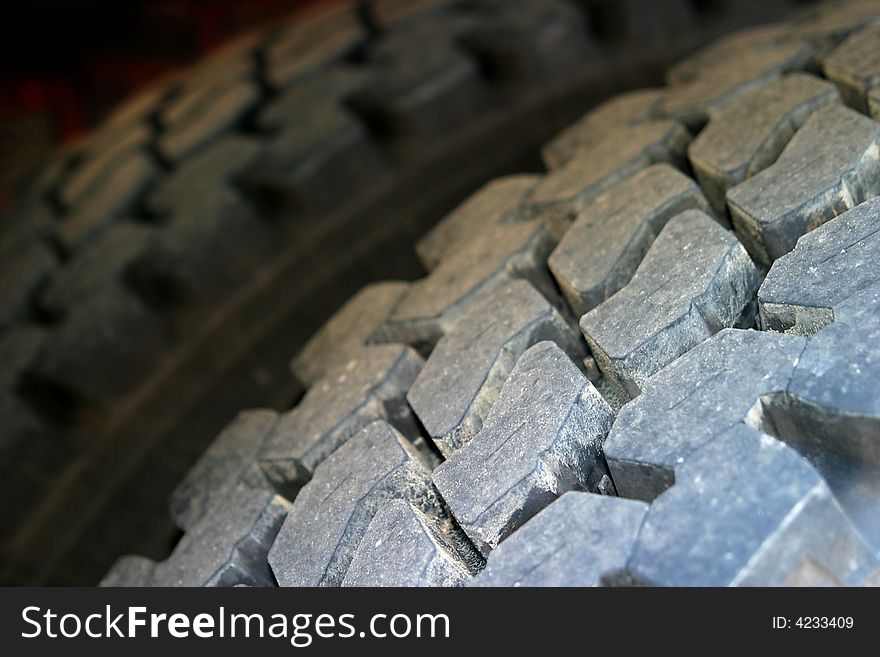 Two tires from a large truck as a close-up shot. Two tires from a large truck as a close-up shot.